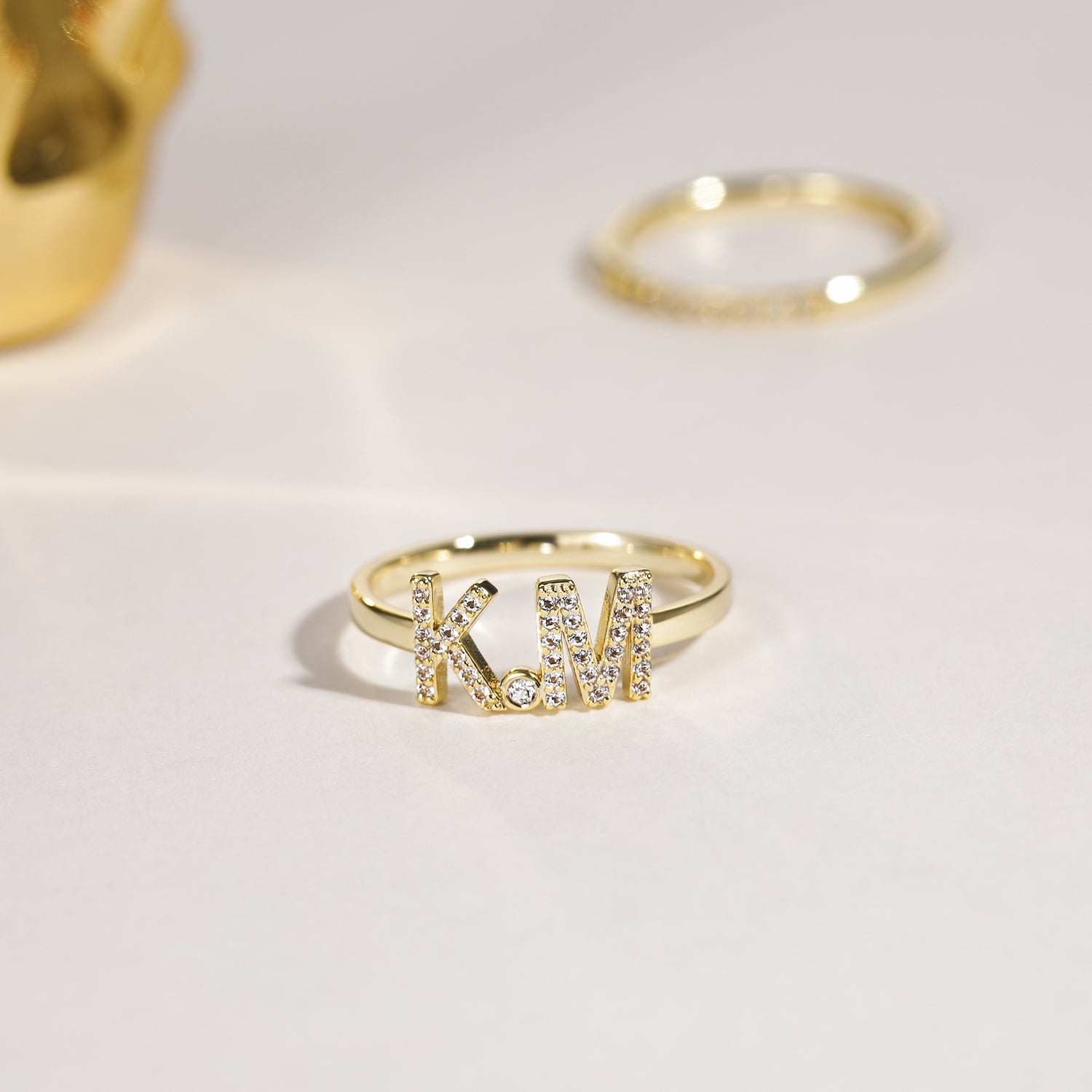 Anello combinato con lettera aperta