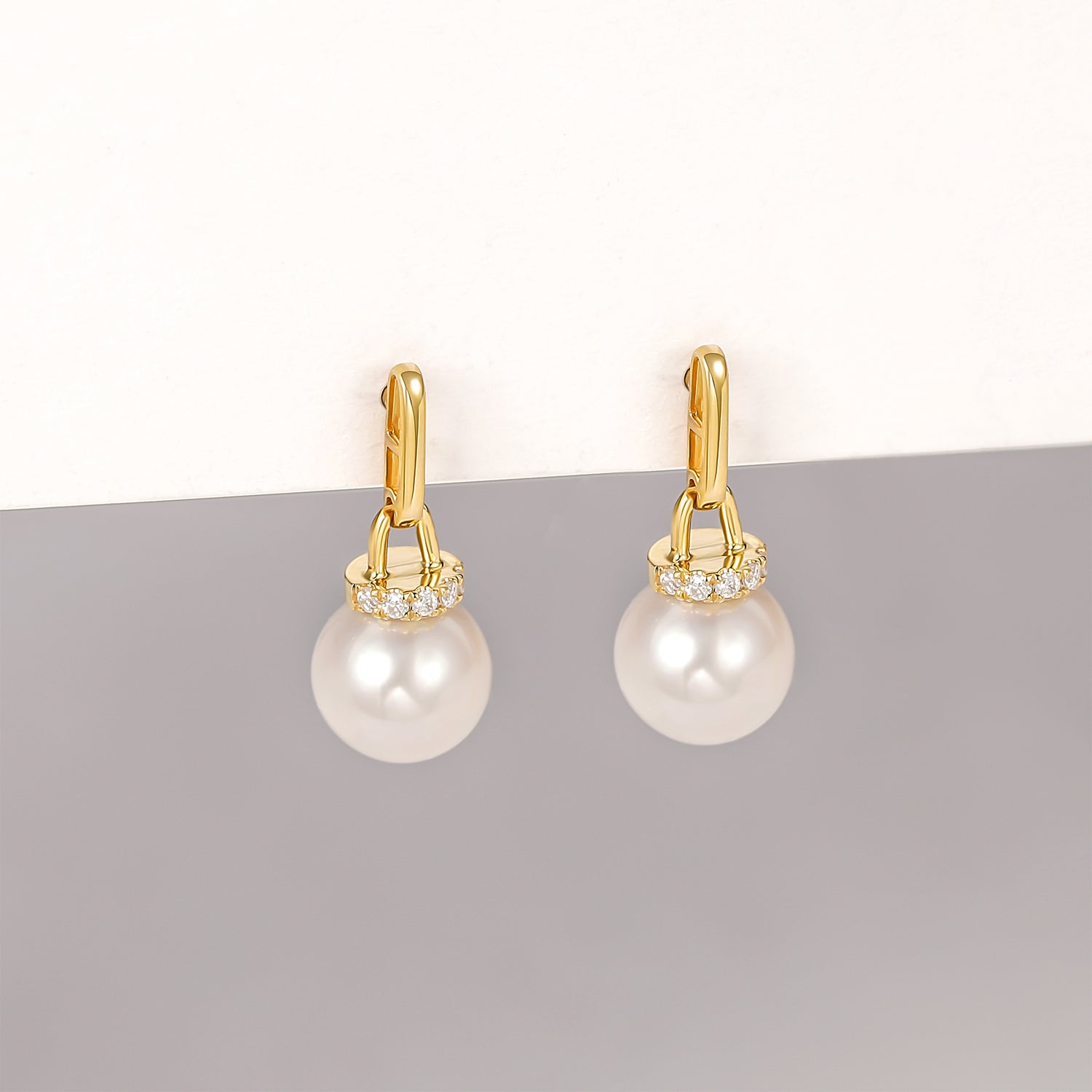 Orecchini pendenti classici con perle d&