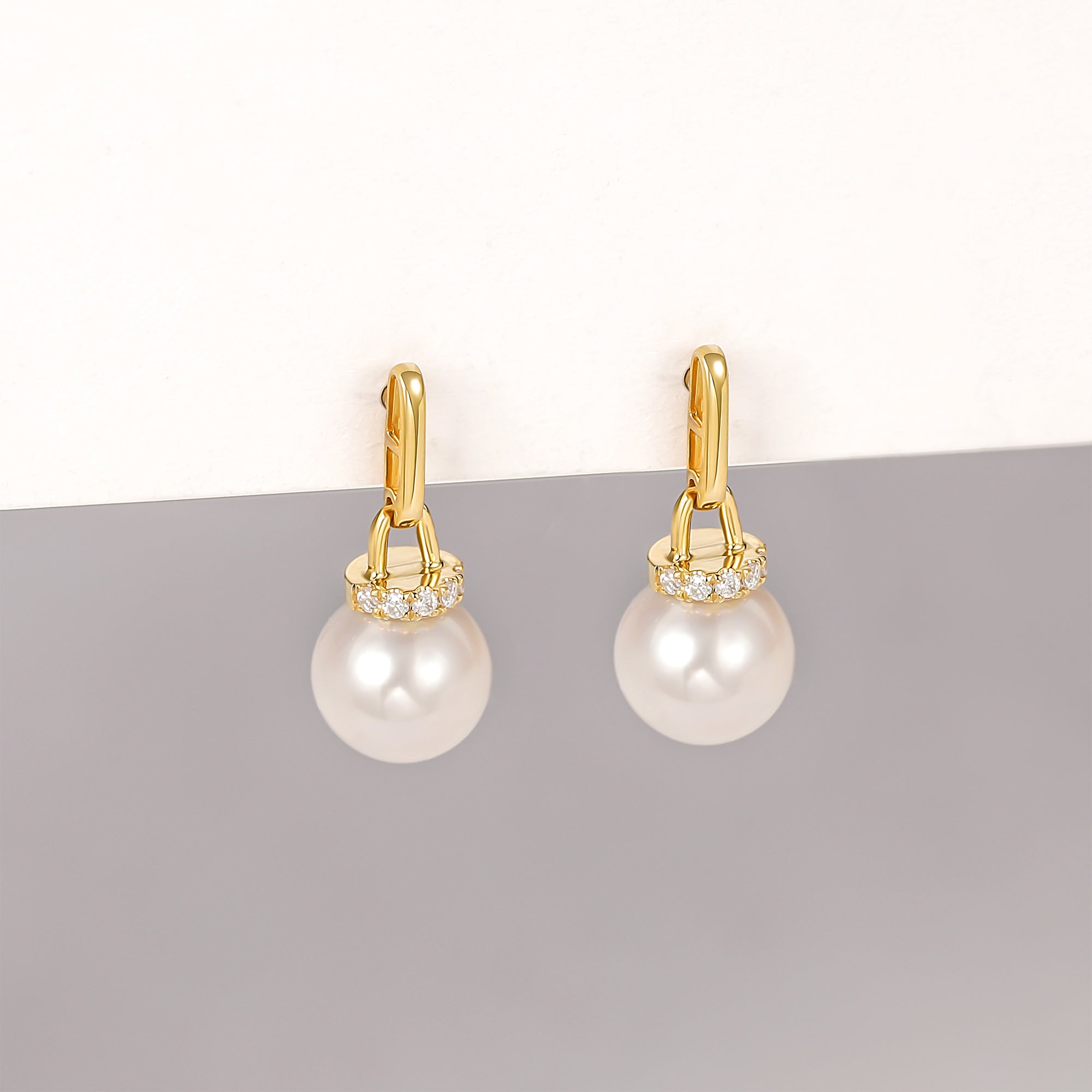 Orecchini pendenti classici con perle d&