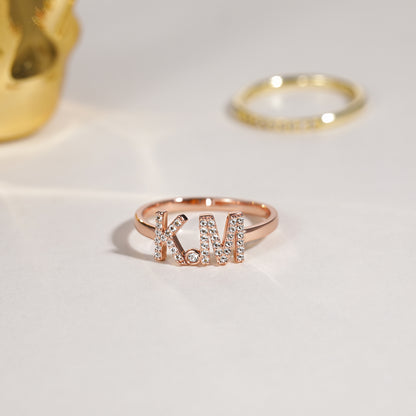 Anello combinato con lettera aperta