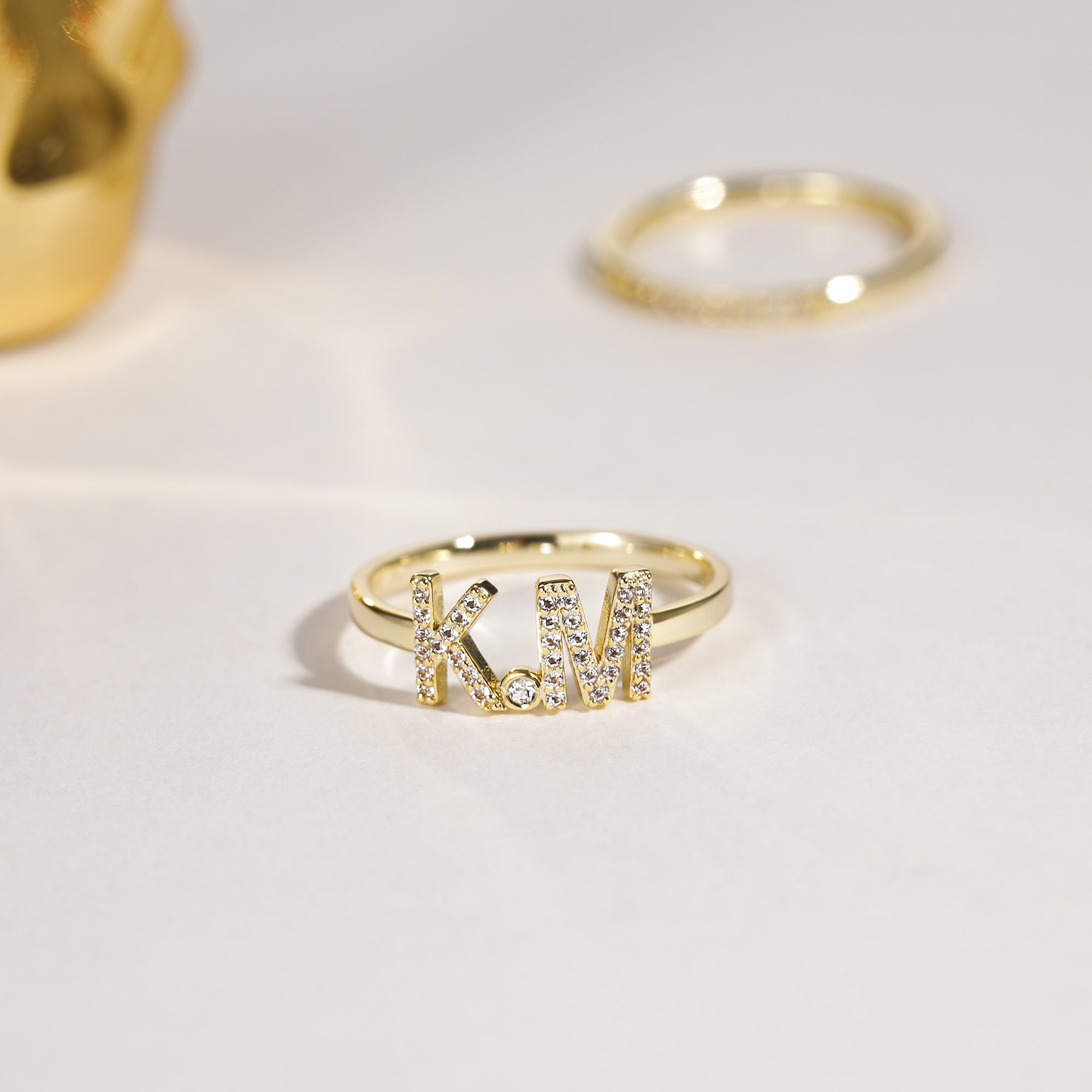 Anello combinato con lettera aperta