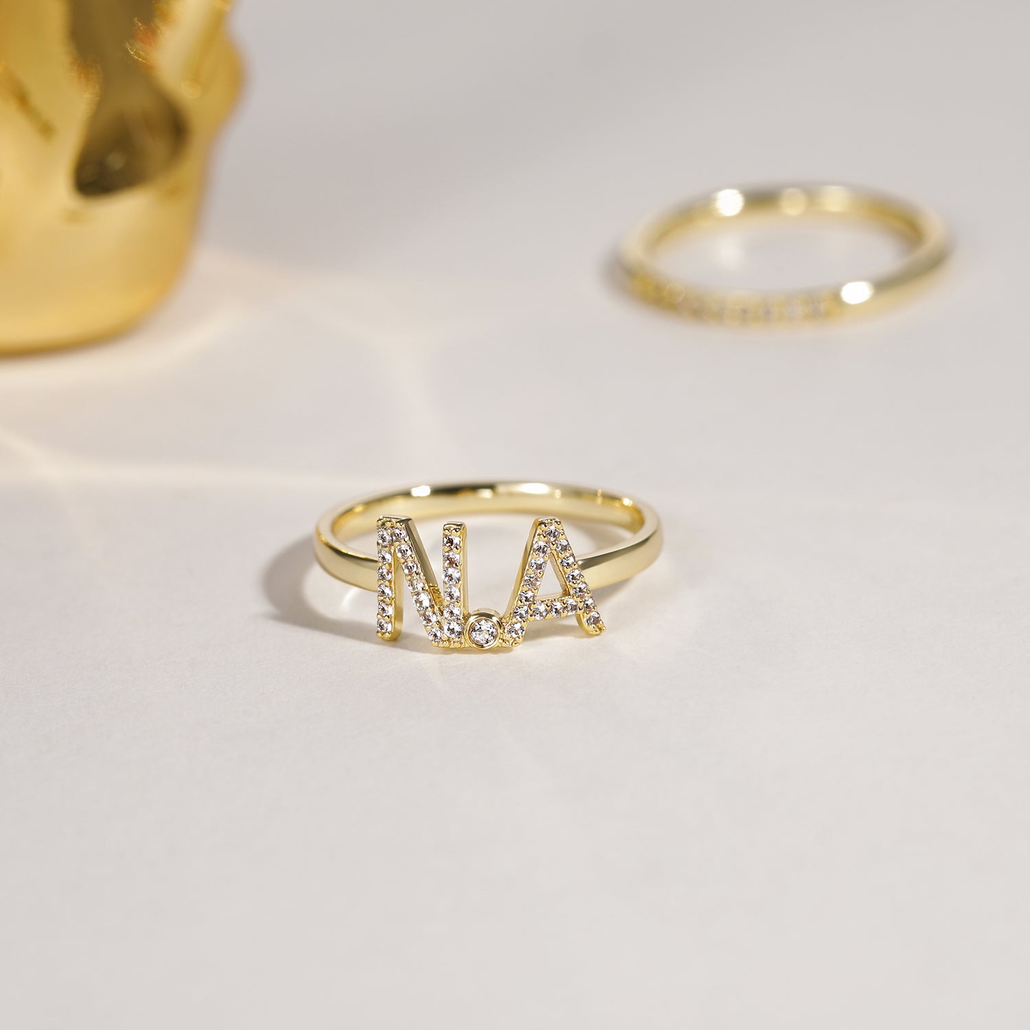 Anello combinato con lettera aperta