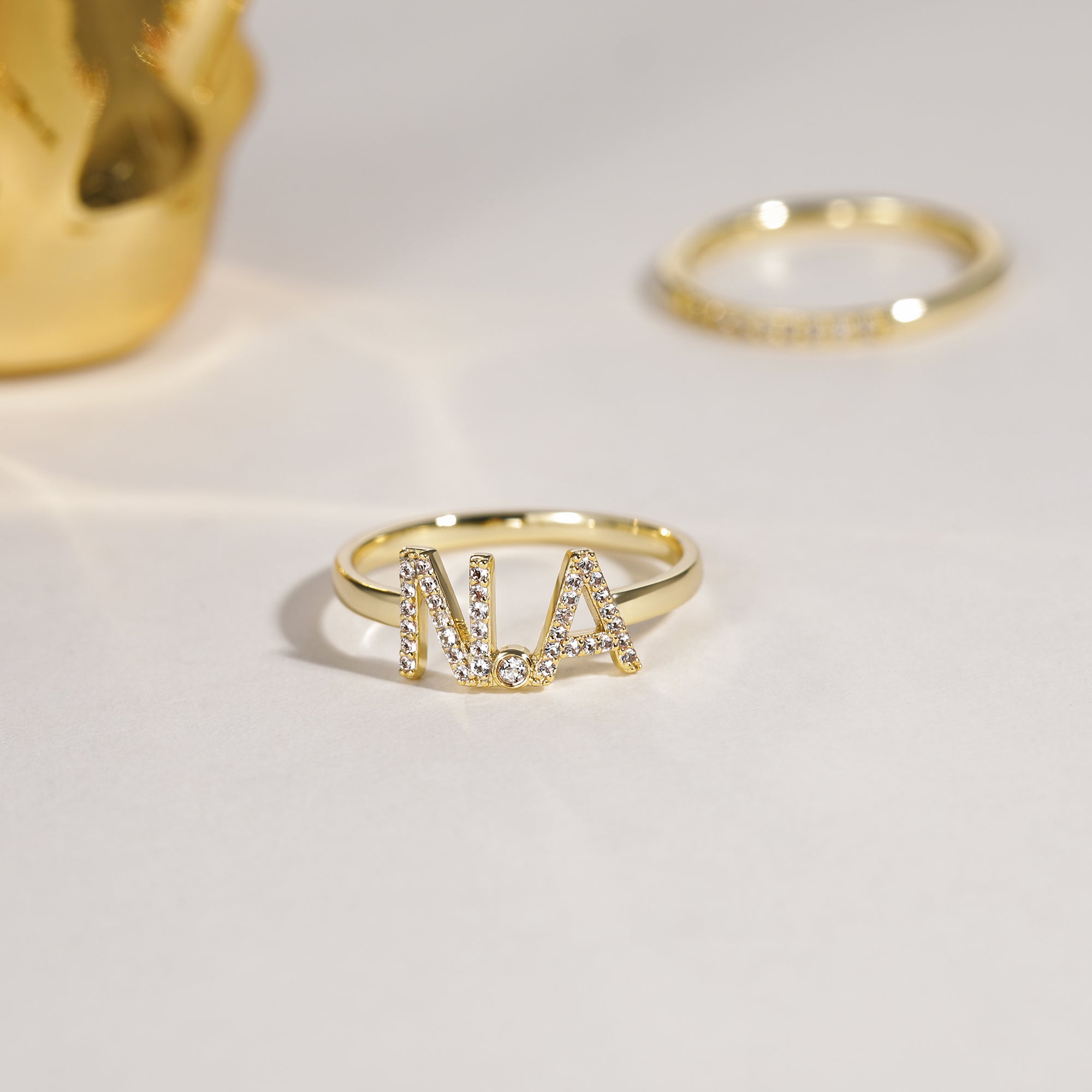 Anello combinato con lettera aperta