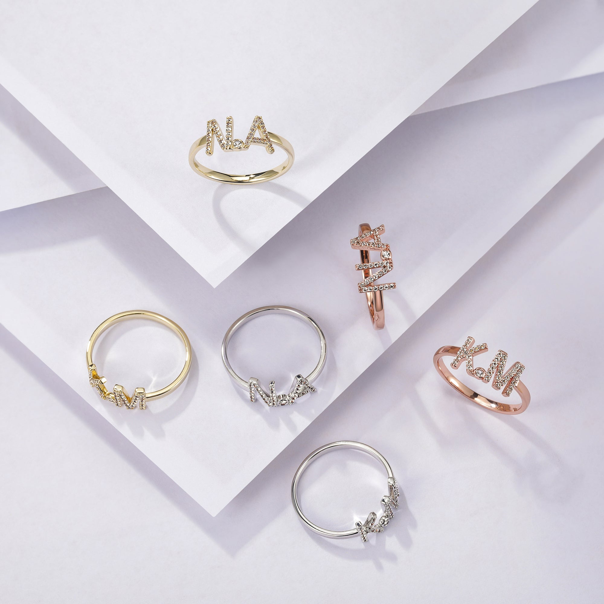 Anello combinato con lettera aperta