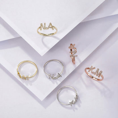 Anello combinato con lettera aperta