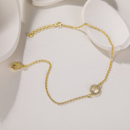 Bracciale in oro con pietre preziose circolari