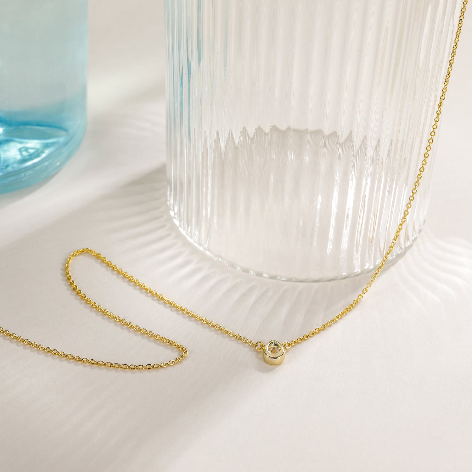 teardrop necklace, yellow gold pendant necklace, personalized gold necklace, birthstone necklace, what is fashion jewelry